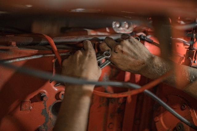mechanic repairing a car