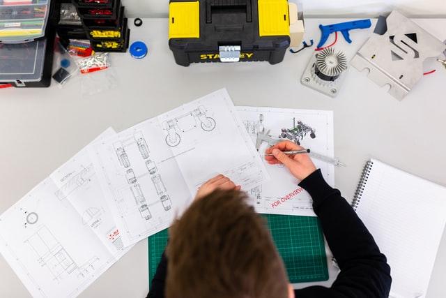 mechanical engineer designing a machine