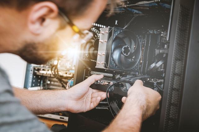 service technician repairing a computer