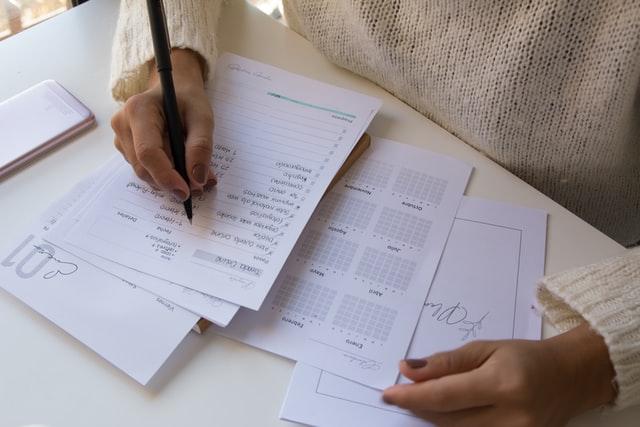 scheduler working on a planning of the employees