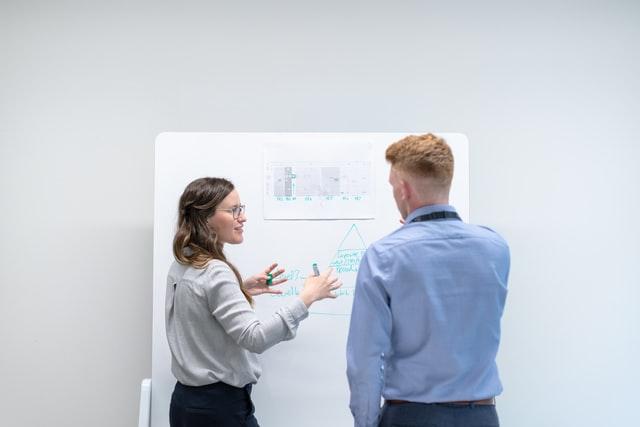 engineering manager discussing job with an engineer