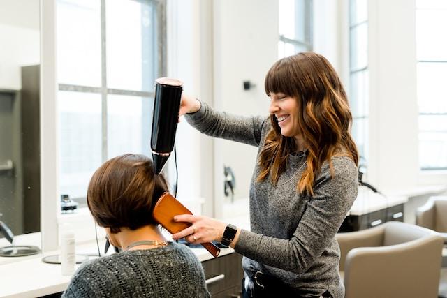 hair stylist working