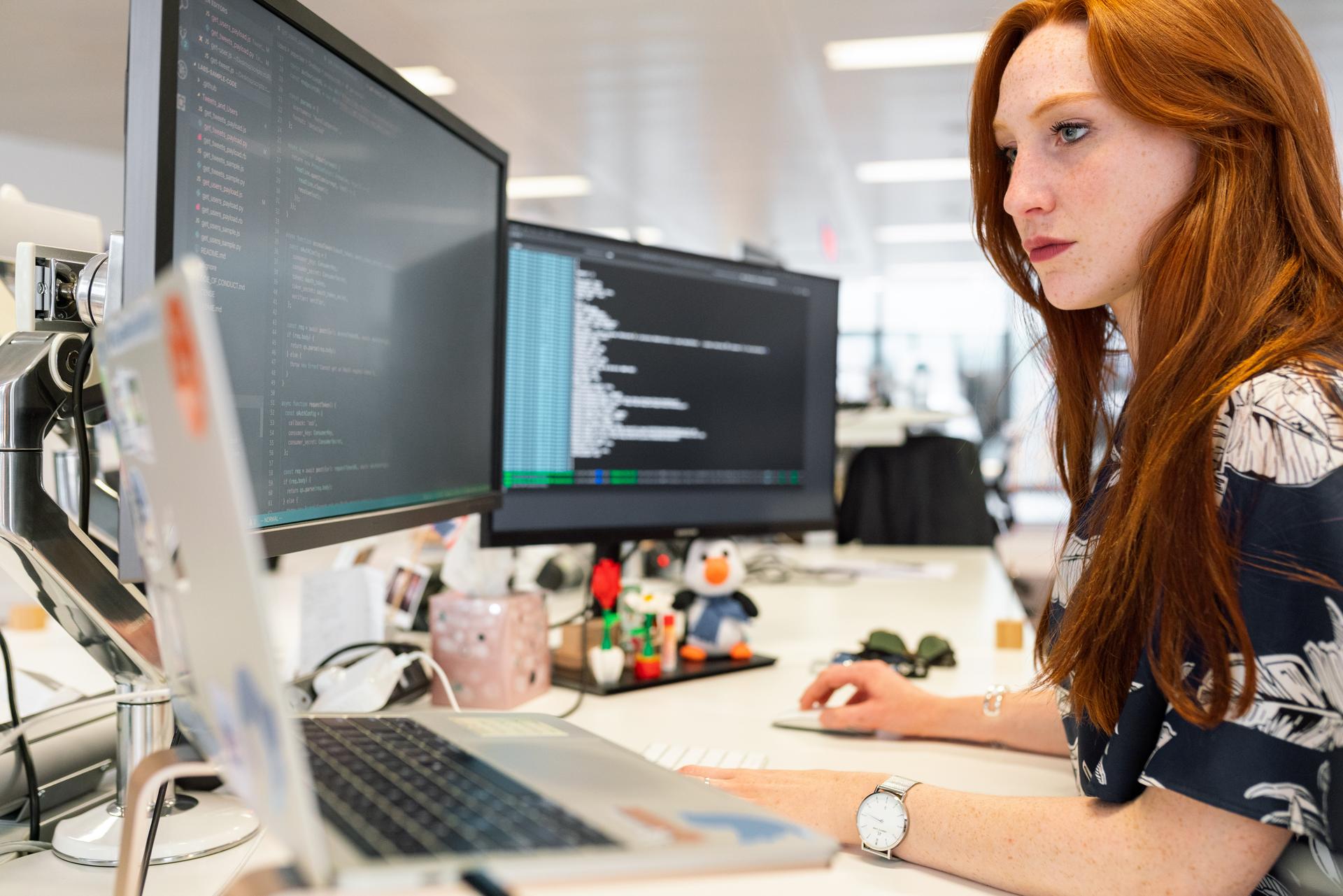 systems administrator working on computers