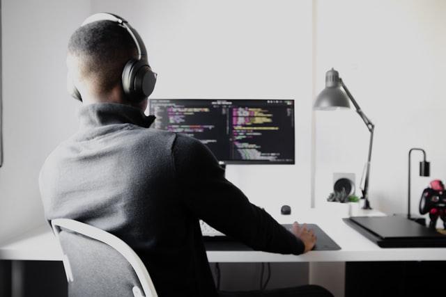security analyst working on computer