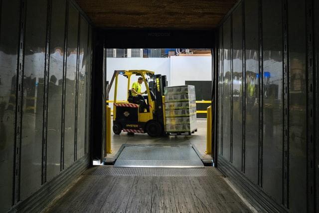 lift operator working on forklift