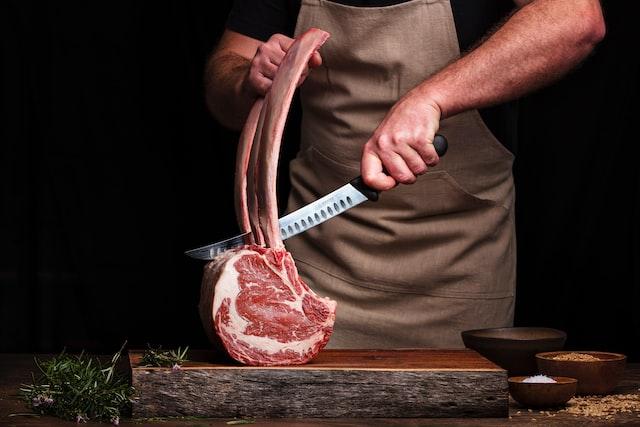 bucher cutting meat