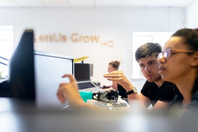 two development engineers working on a computer