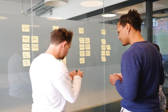 project coordinator working with a colleague